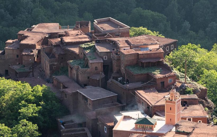 Family trekking Atlas Mountains.